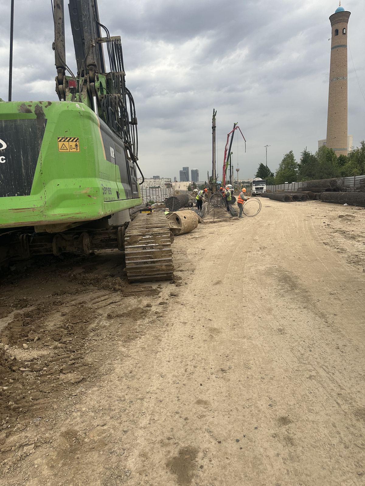 Rig working near city skyline
